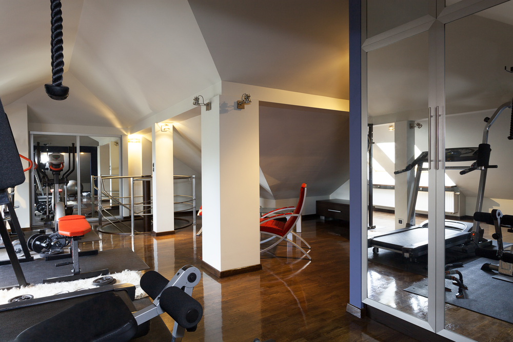 a home gym completely designed with mirrors